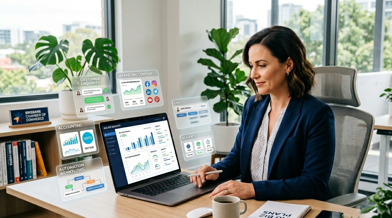 Australian small business owner using AI tools for small business on a laptop in a modern office.
